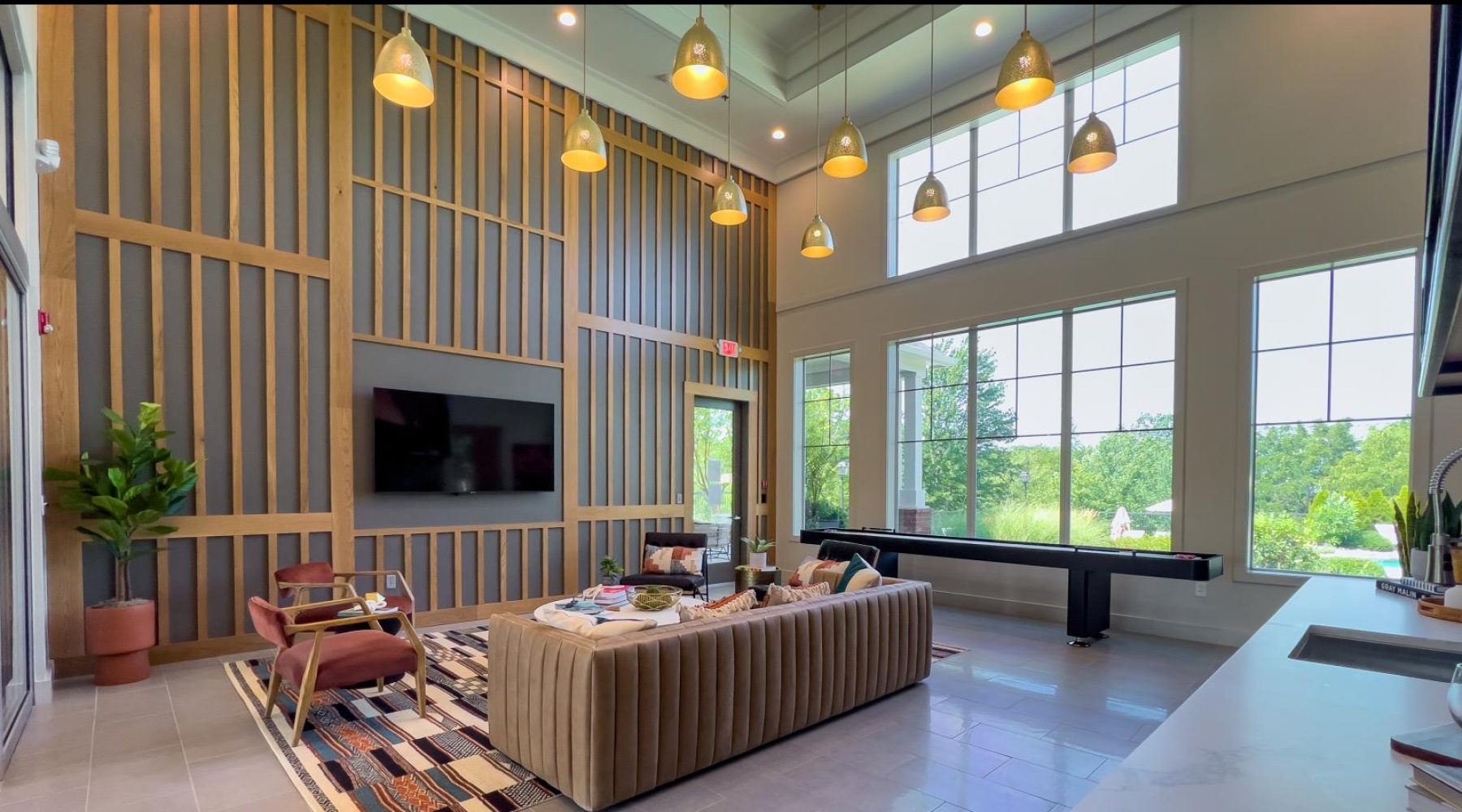 Beautiful clubroom with lounge seating and natural lighting