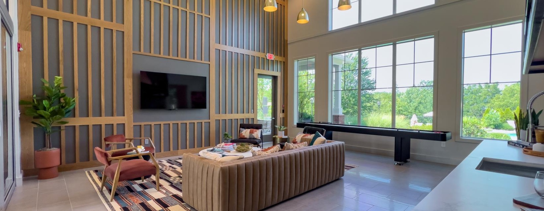 Beautiful clubroom with lounge seating and natural lighting