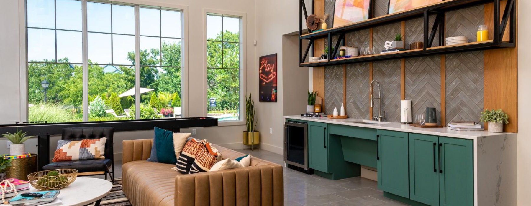 Beautiful clubroom with lounge seating and natural lighting